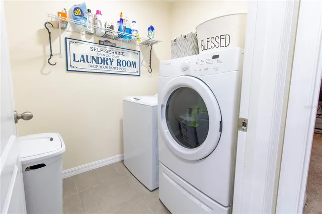 a bedroom with a bed and a desk
