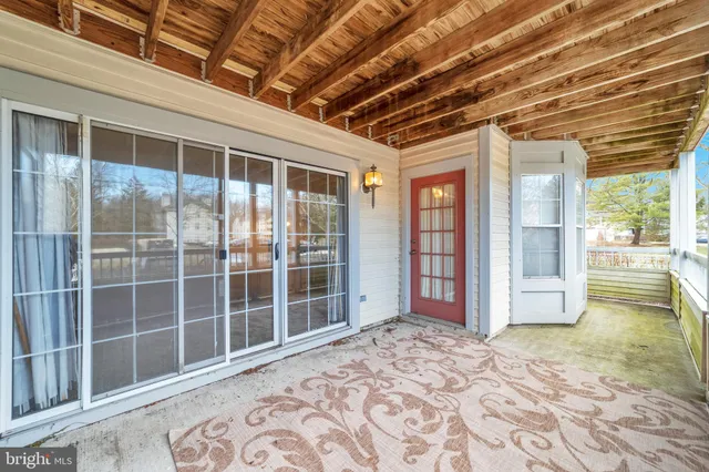 a view of a room with a large window