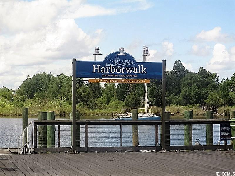 176 King George Lane Georgetown, SC 29440 - Photo 17 of 17 View of dock featuring a water view