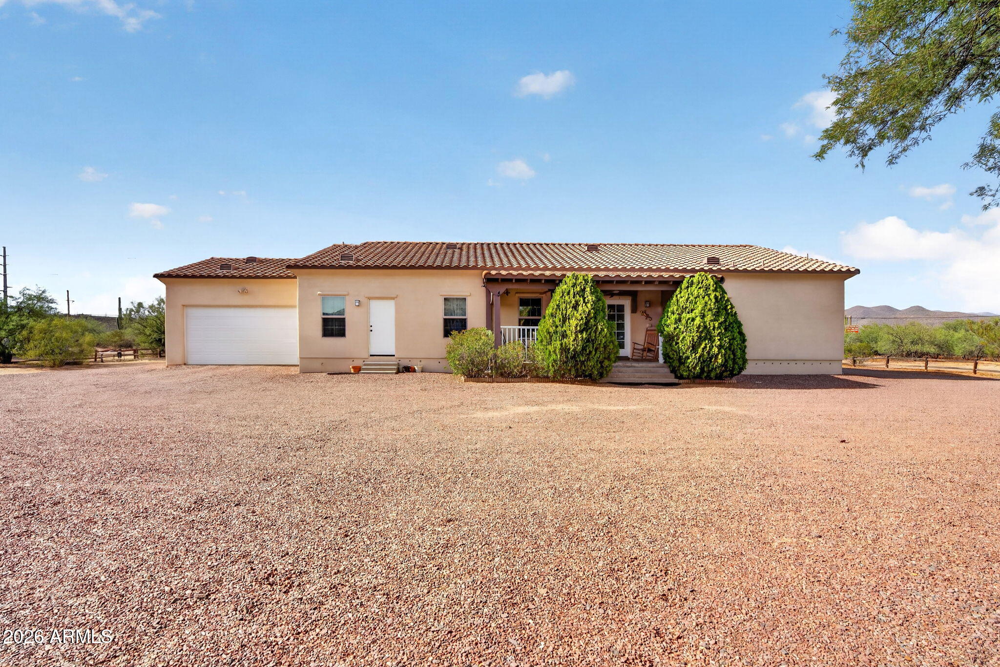 2929 West New River Road New River, AZ 85087 - Photo 43 of 53 a view of a house with a yard and potted plants