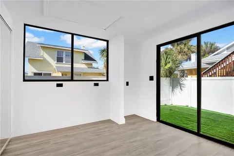 a view of a room that has a large window