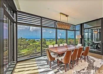 a view of a patio with a table chairs and backyard