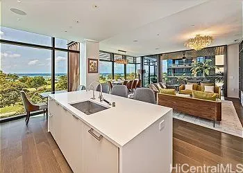 a view of a kitchen with a large window