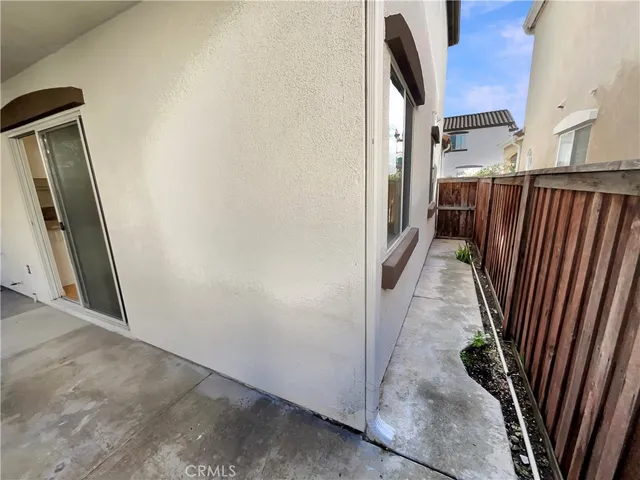 a view of a hallway with staircase