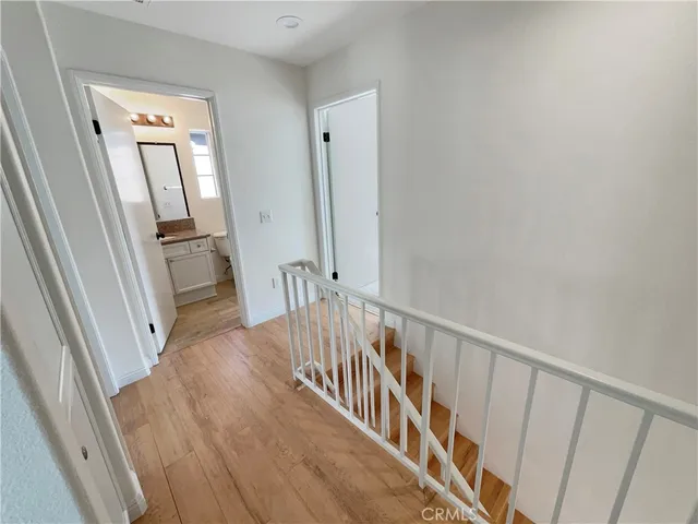 a view of multiple houses with a street