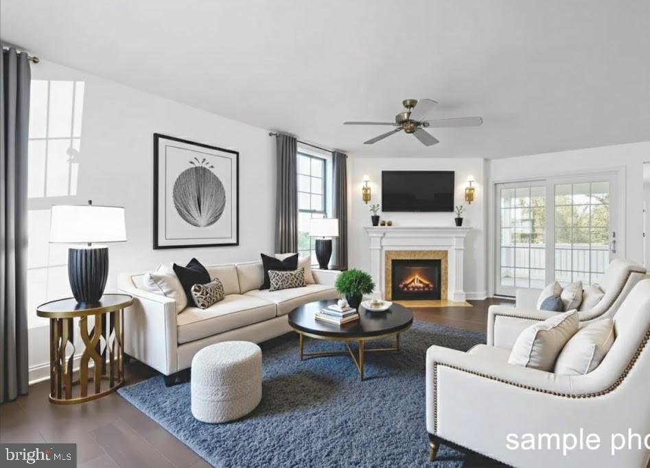 13 Castle Drive Robesonia, PA 19551 - Photo 6 of 22 a living room with furniture a fireplace and a flat screen tv
