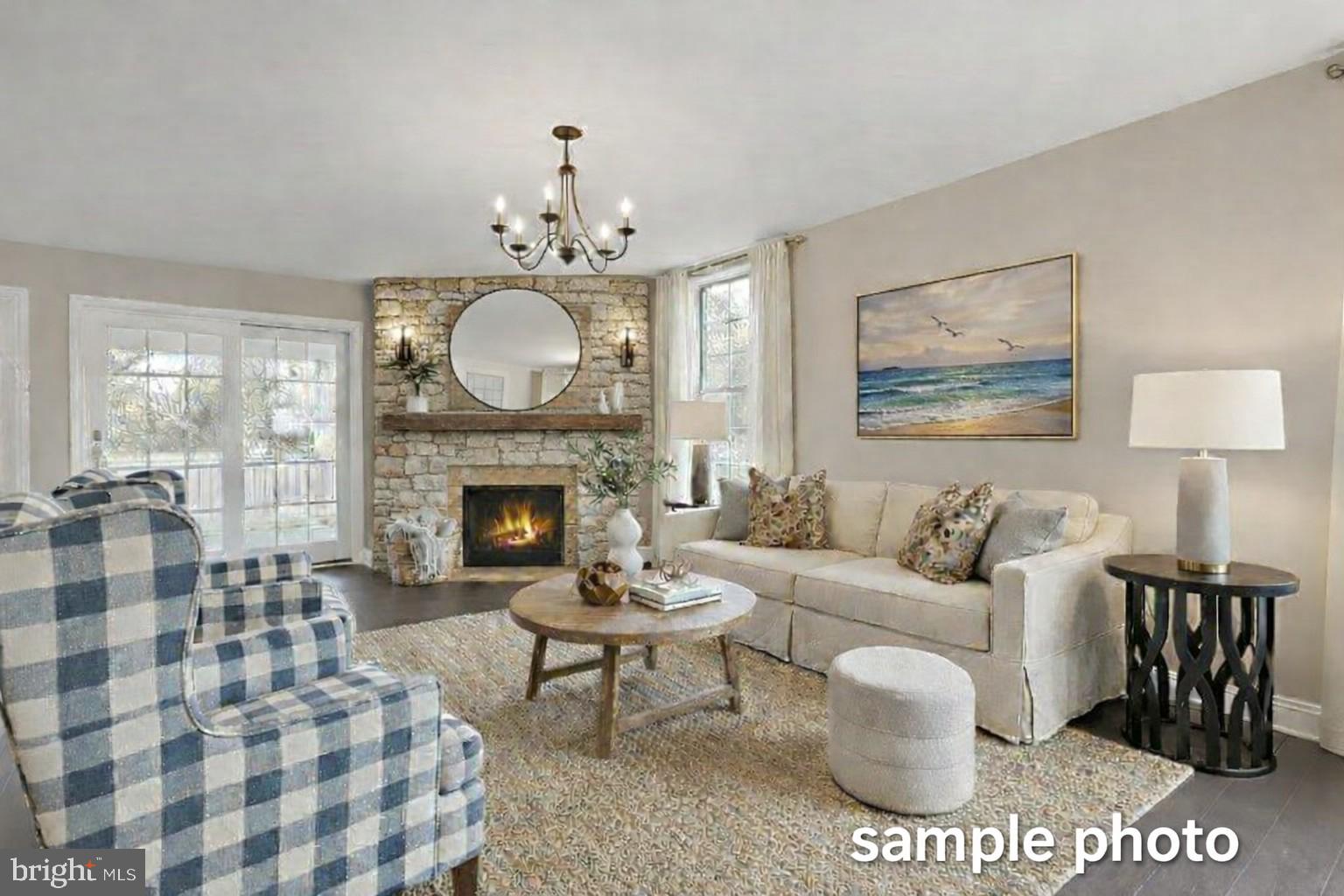 13 Castle Drive Robesonia, PA 19551 - Photo 7 of 22 a living room with furniture a fireplace and a table