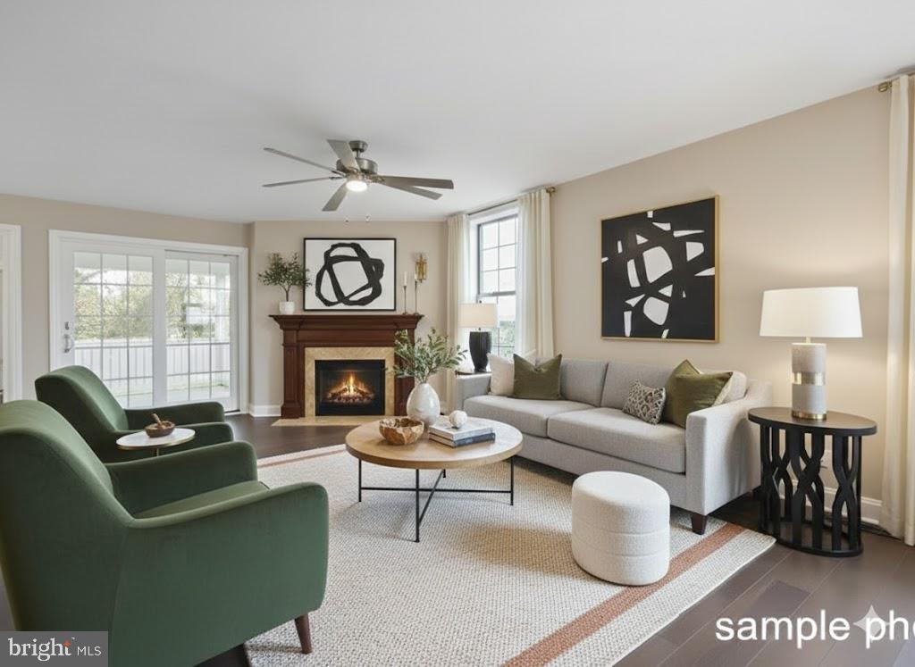 13 Castle Drive Robesonia, PA 19551 - Photo 9 of 22 a living room with furniture a fireplace and a table