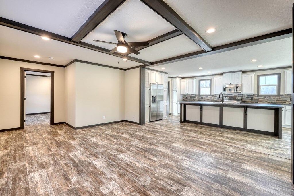 2045 Upper Bell Creek Road Hiawassee, GA 30546 - Photo 13 of 47 a view of an empty room with window and wooden floor