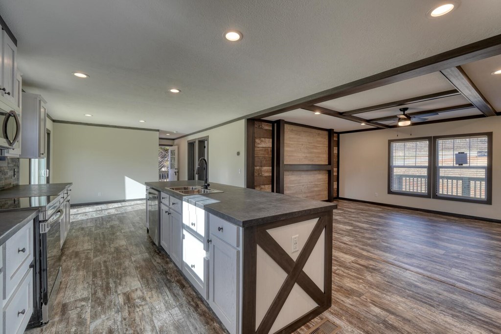 2045 Upper Bell Creek Road Hiawassee, GA 30546 - Photo 16 of 47 a kitchen with stainless steel appliances granite countertop a stove and a refrigerator