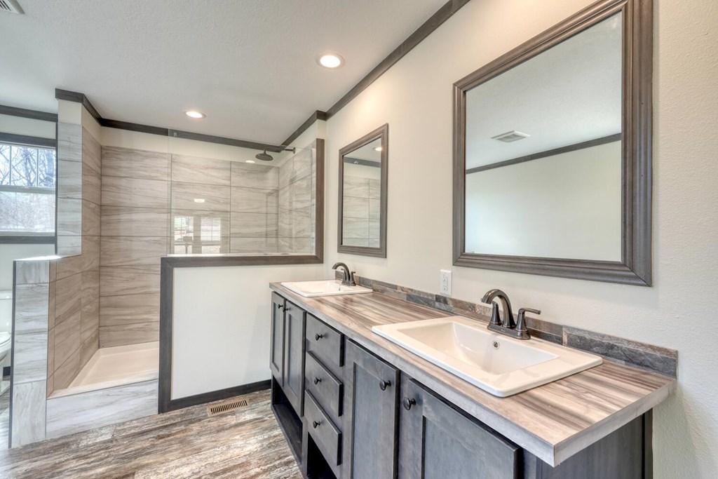 2045 Upper Bell Creek Road Hiawassee, GA 30546 - Photo 25 of 47 a bathroom with a sink and a mirror