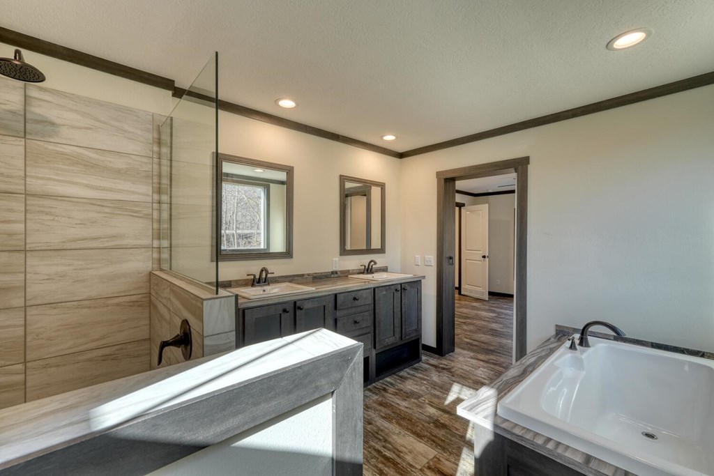 2045 Upper Bell Creek Road Hiawassee, GA 30546 - Photo 28 of 47 a bathroom with a tub sink and mirror