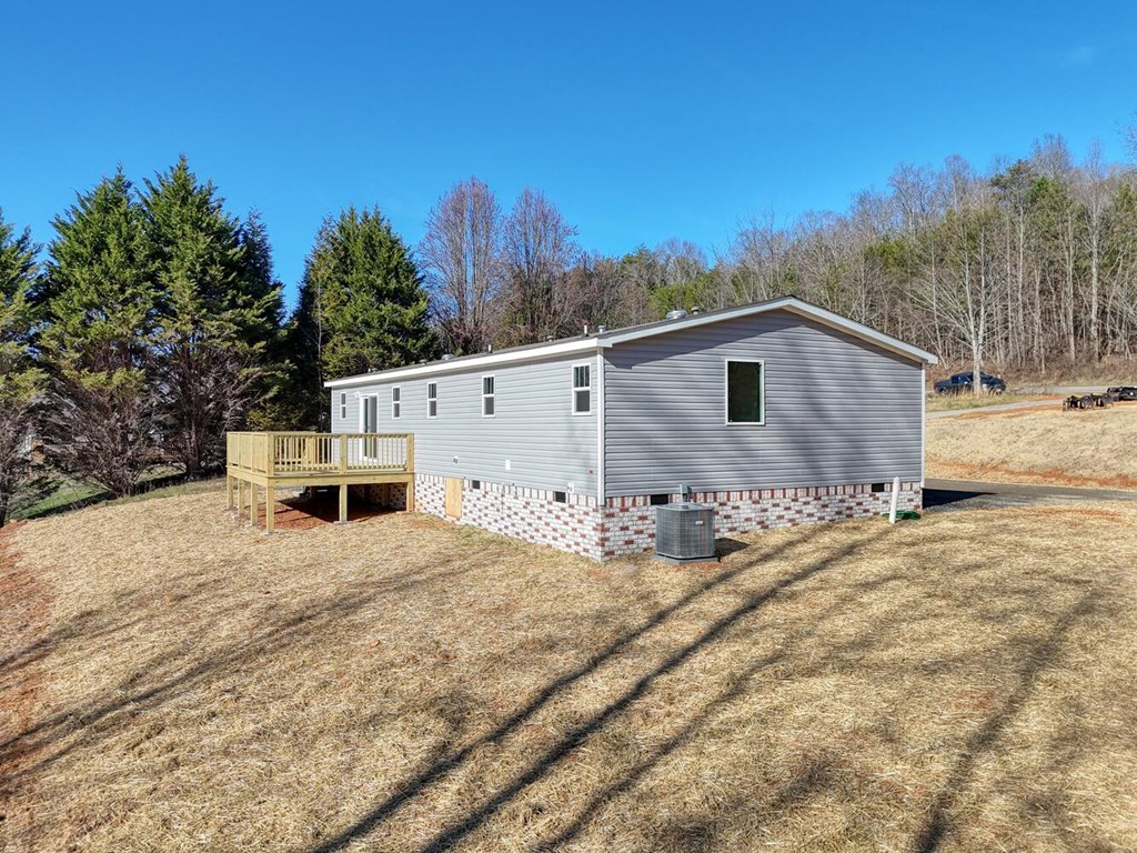 2045 Upper Bell Creek Road Hiawassee, GA 30546 - Photo 7 of 47 a view of a house with a snow in the background