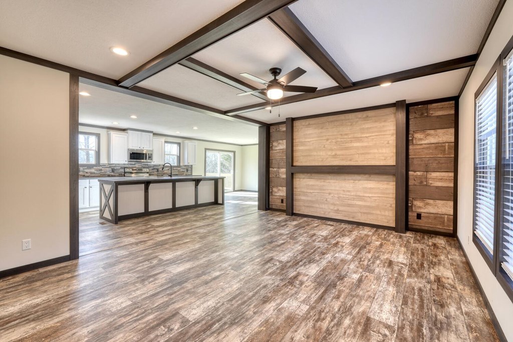 2045 Upper Bell Creek Road Hiawassee, GA 30546 - Photo 10 of 47 a view of an empty room with wooden floor and a window