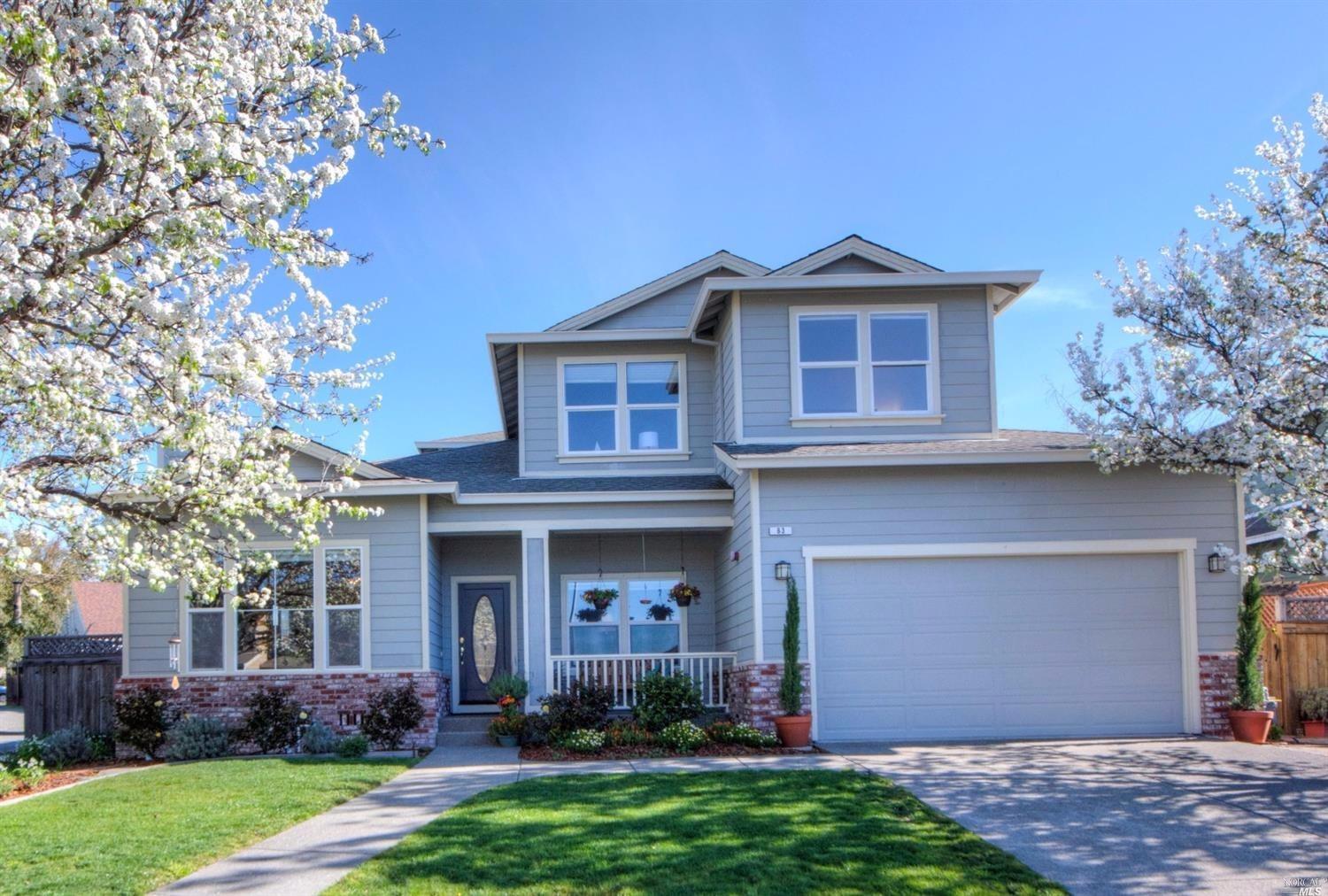 63 Montevideo Way San Rafael, CA 94903 - Photo 1 of 1 a front view of a house with a yard and garage