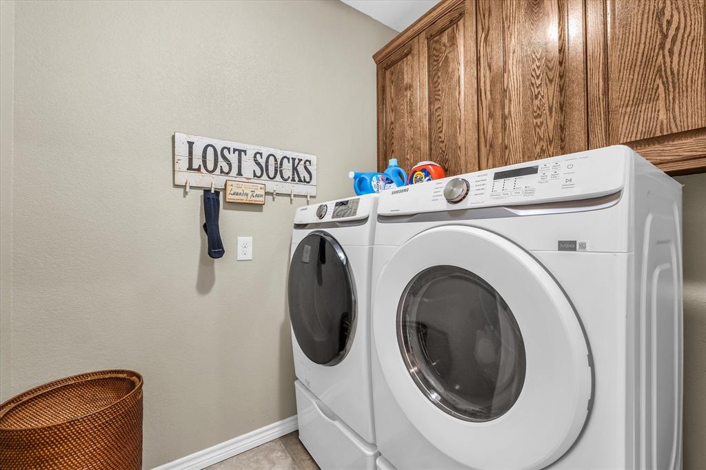 613 Bone Road Valley Mills, TX 76689 - Photo 24 of 40 a utility room with dryer and washer