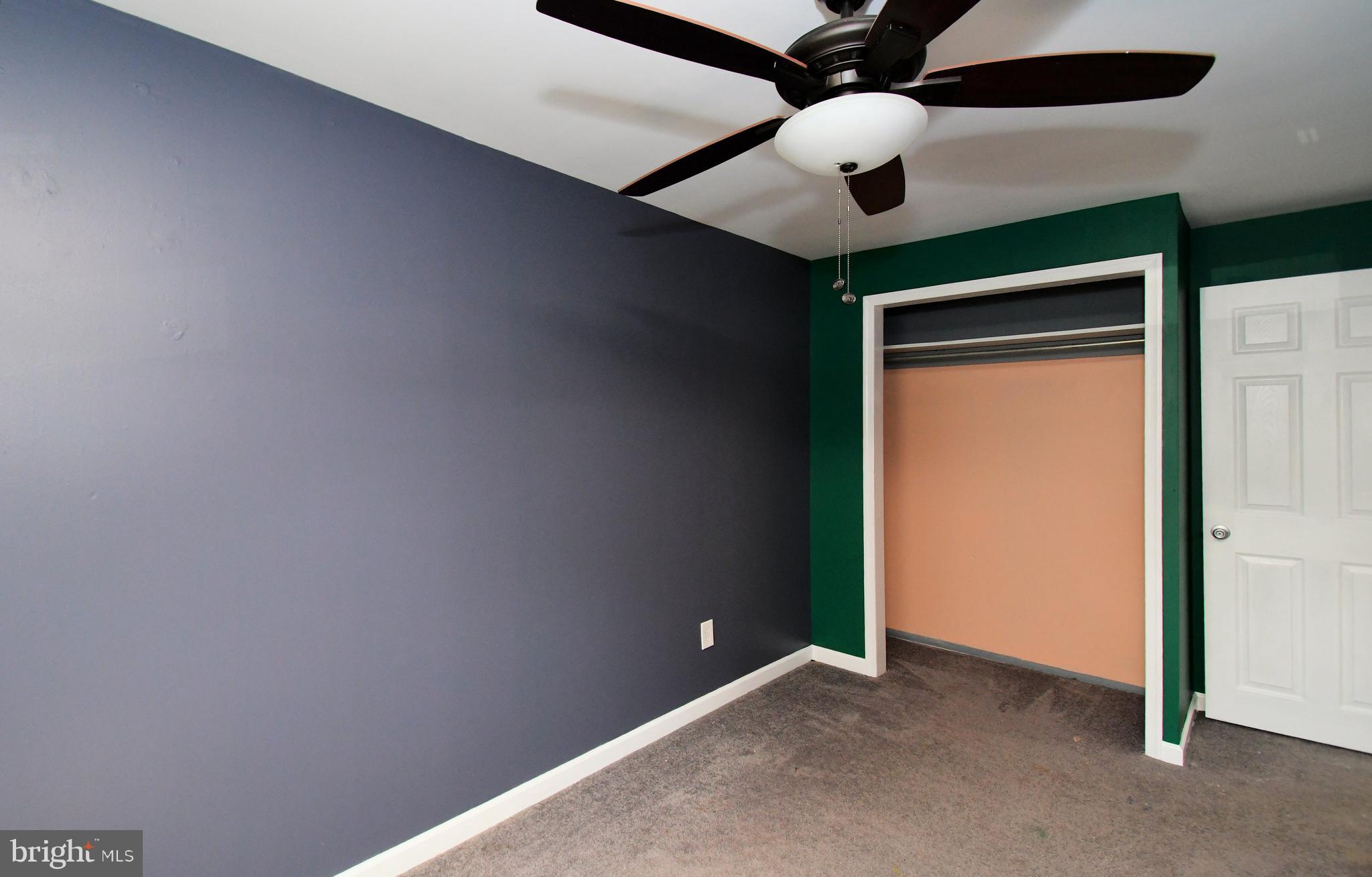 12134 Rambler Road Philadelphia, PA 19154 - Photo 34 of 40 an empty room with a ceiling fan and a fan