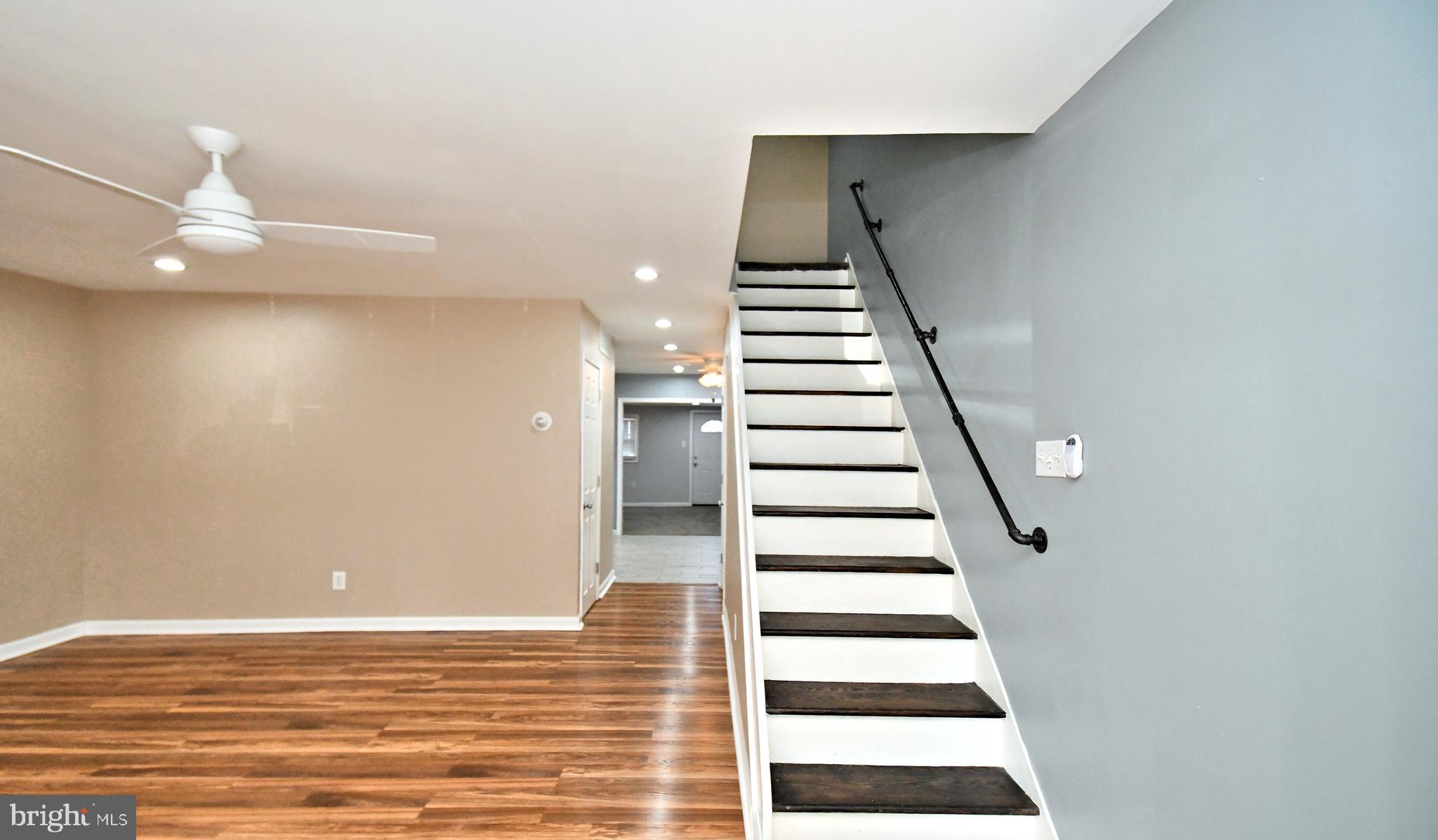 12134 Rambler Road Philadelphia, PA 19154 - Photo 4 of 40 a view of an empty room with stairs