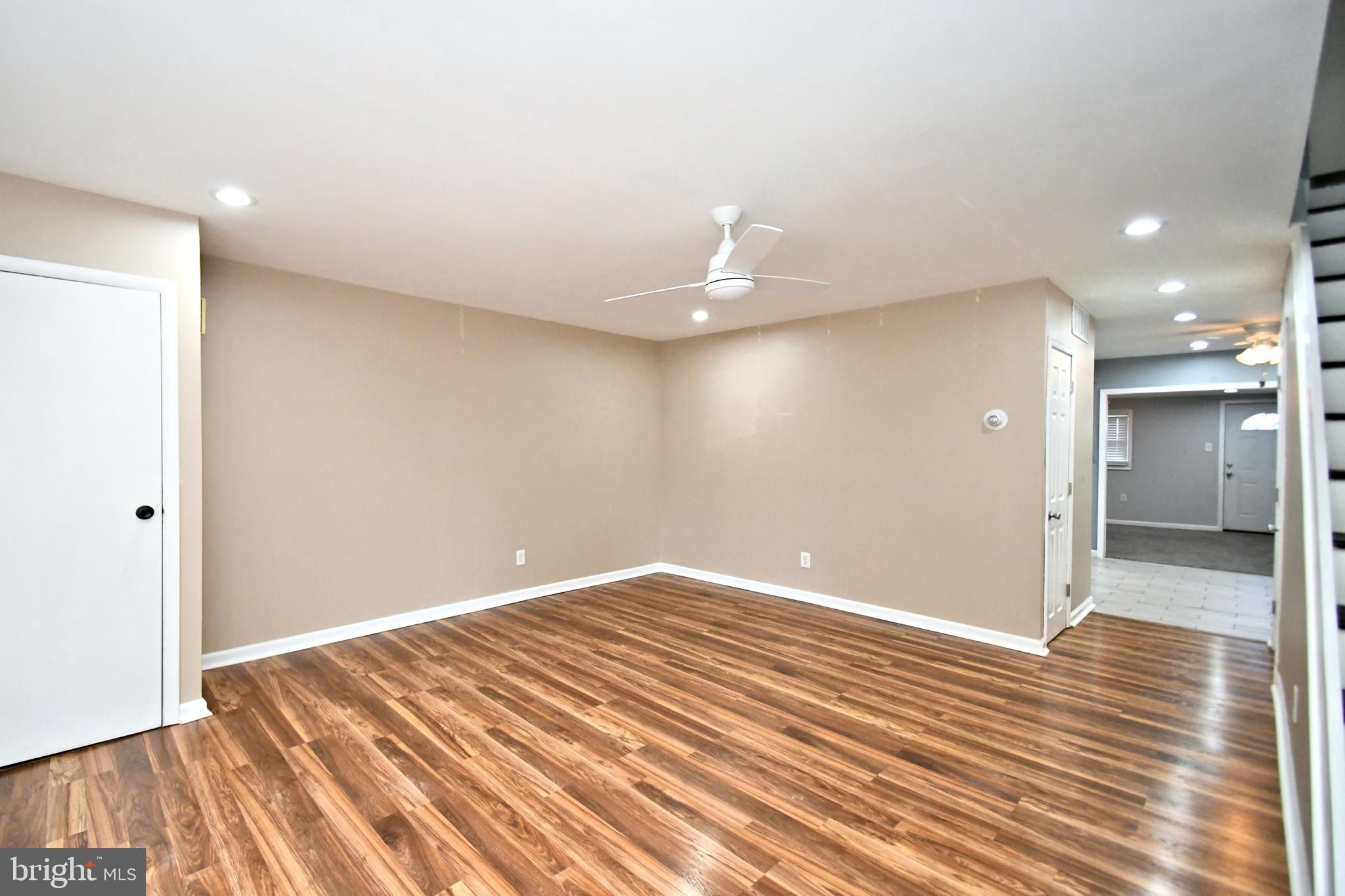 12134 Rambler Road Philadelphia, PA 19154 - Photo 5 of 40 a view of an empty room with wooden floor
