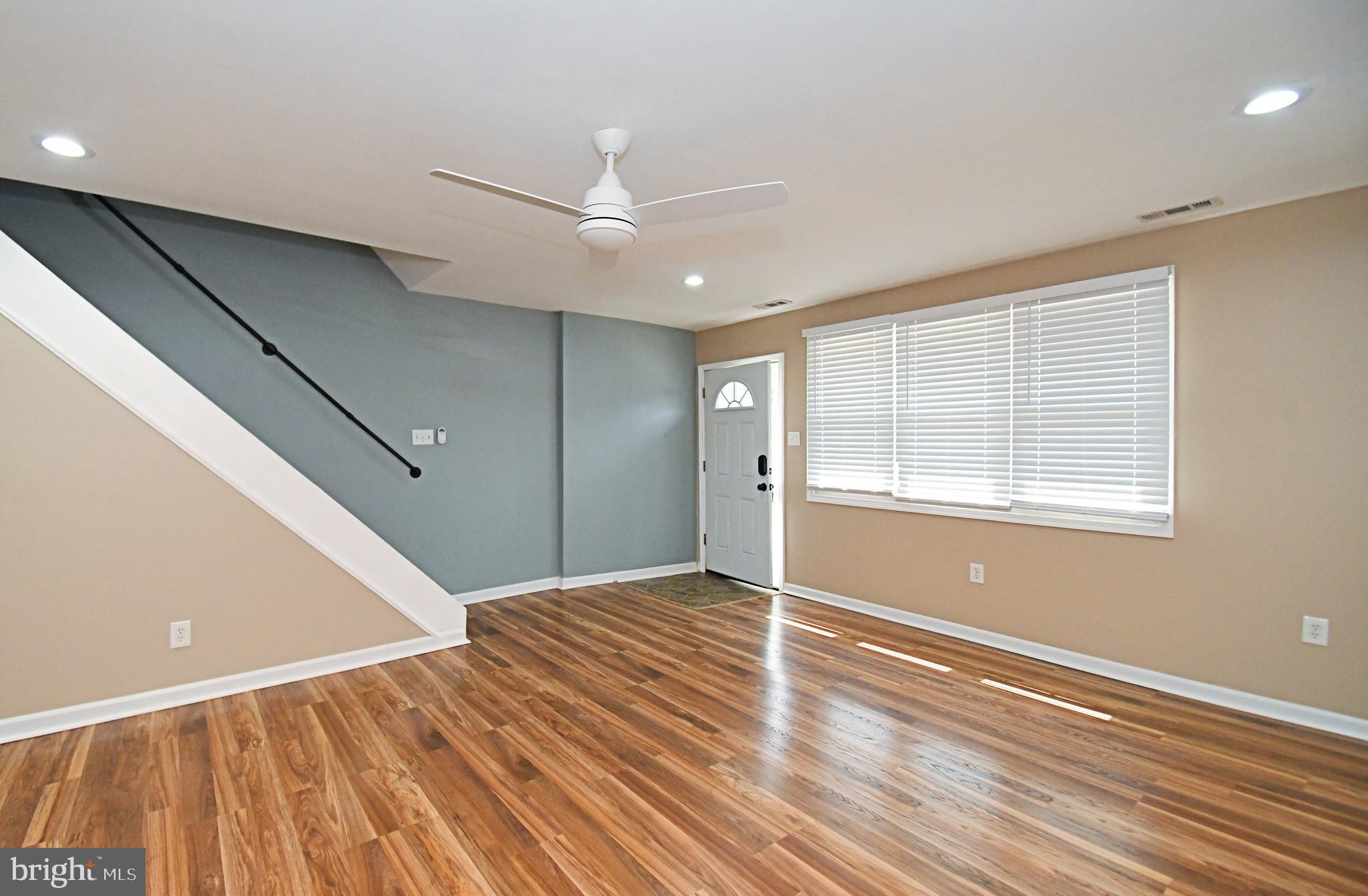 12134 Rambler Road Philadelphia, PA 19154 - Photo 7 of 40 a view of empty room with wooden floor and fan