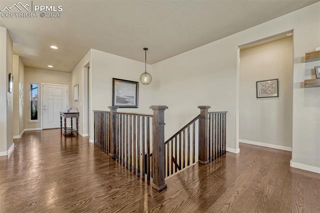 Open-concept living with newly finished hardwood floors