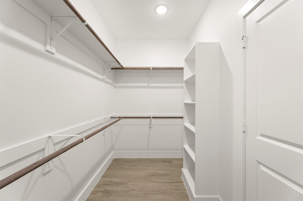2359 Bell Way Forney, TX 75126 - Photo 20 of 31 a view of walk in closet with empty racks
