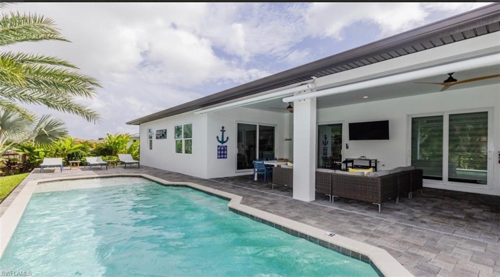 118 Bermuda Road Marco Island, FL 34145 - Photo 13 of 16 a view of a house with backyard and porch