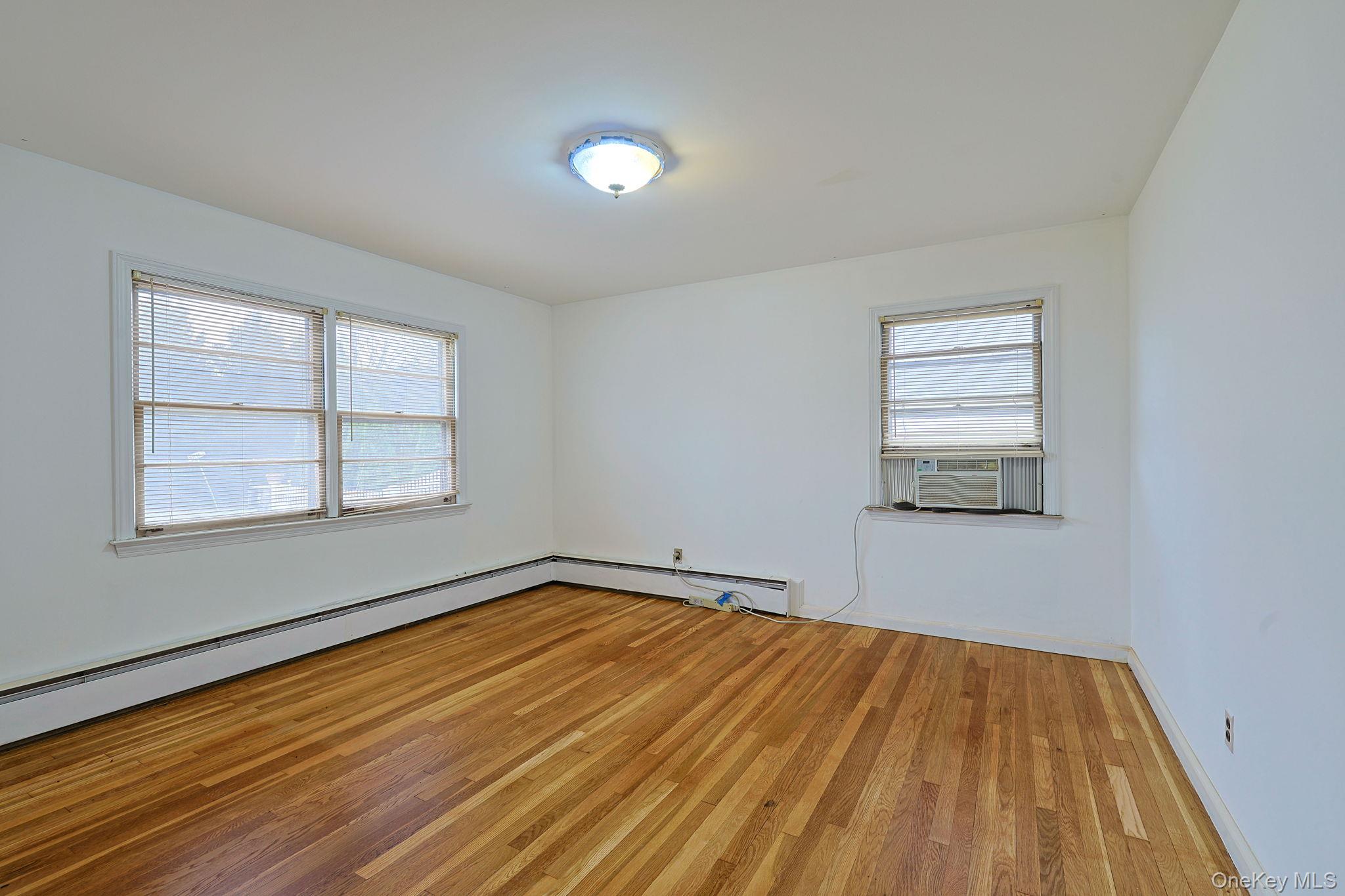 34 Old Bedford Road Goldens Bridge, NY 10526 - Photo 11 of 38 a view of empty room with wooden floor and fan