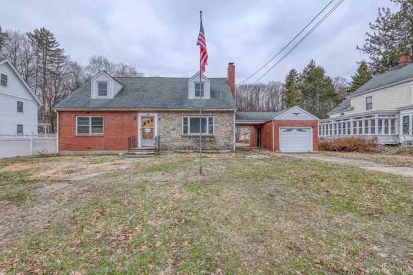 a front view of house with yard