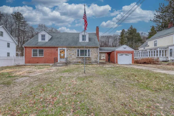 a front view of house with yard