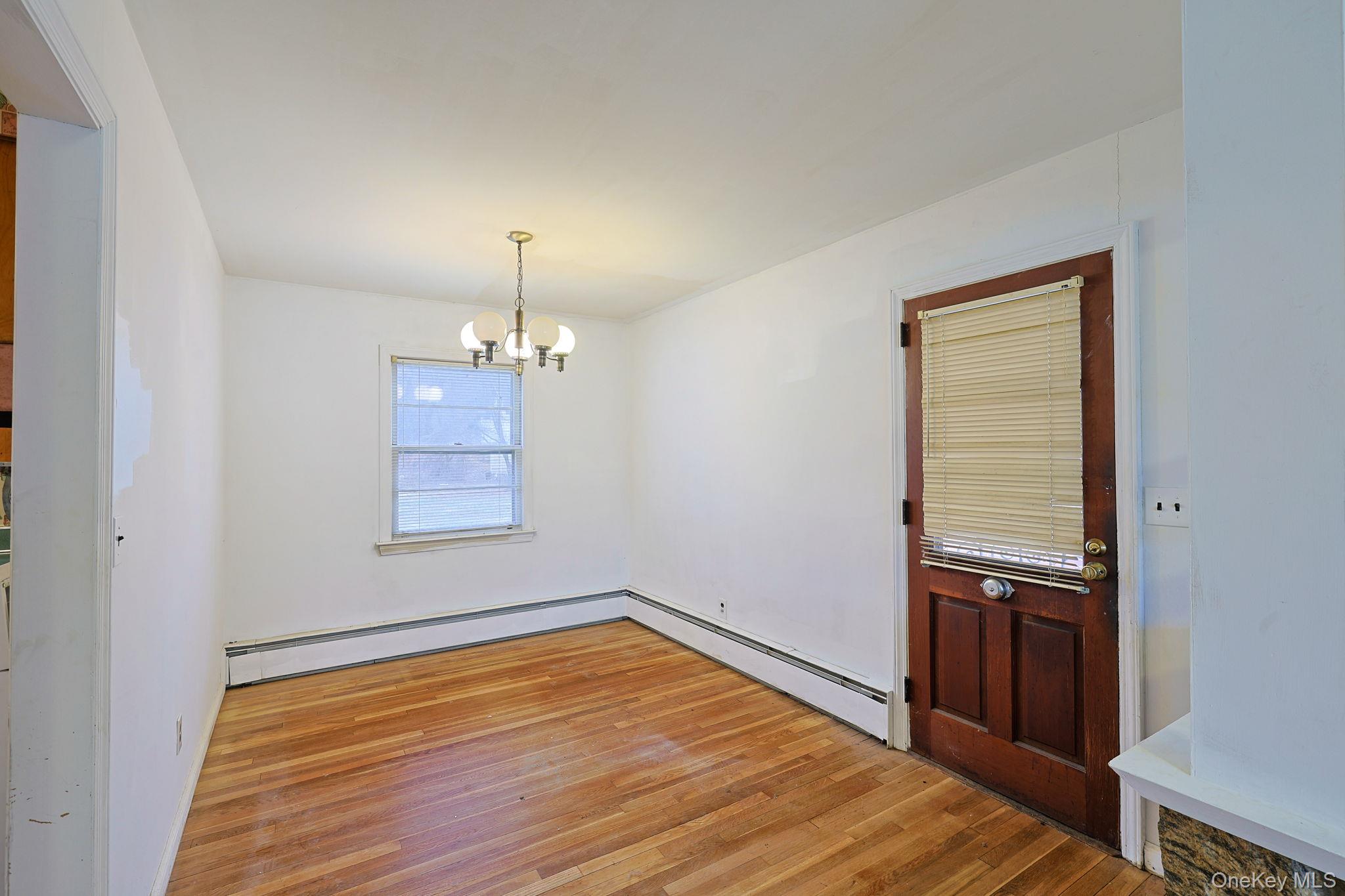 34 Old Bedford Road Goldens Bridge, NY 10526 - Photo 6 of 38 wooden floor in an empty room with a window