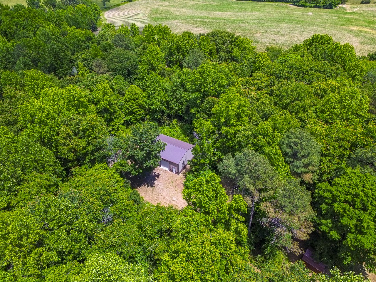 23 Grassy Branch Road Flintville, TN 37335 - Photo 14 of 24 a view of a house with a yard