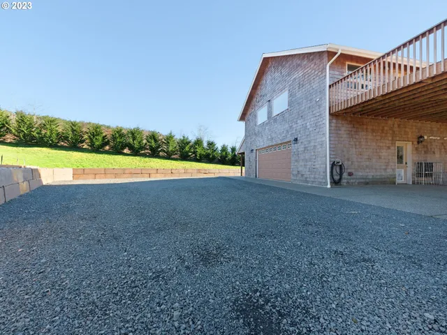 a view of an house with swimming pool and outdoor space