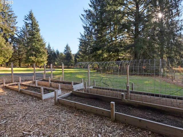a view of a park with wooden benches