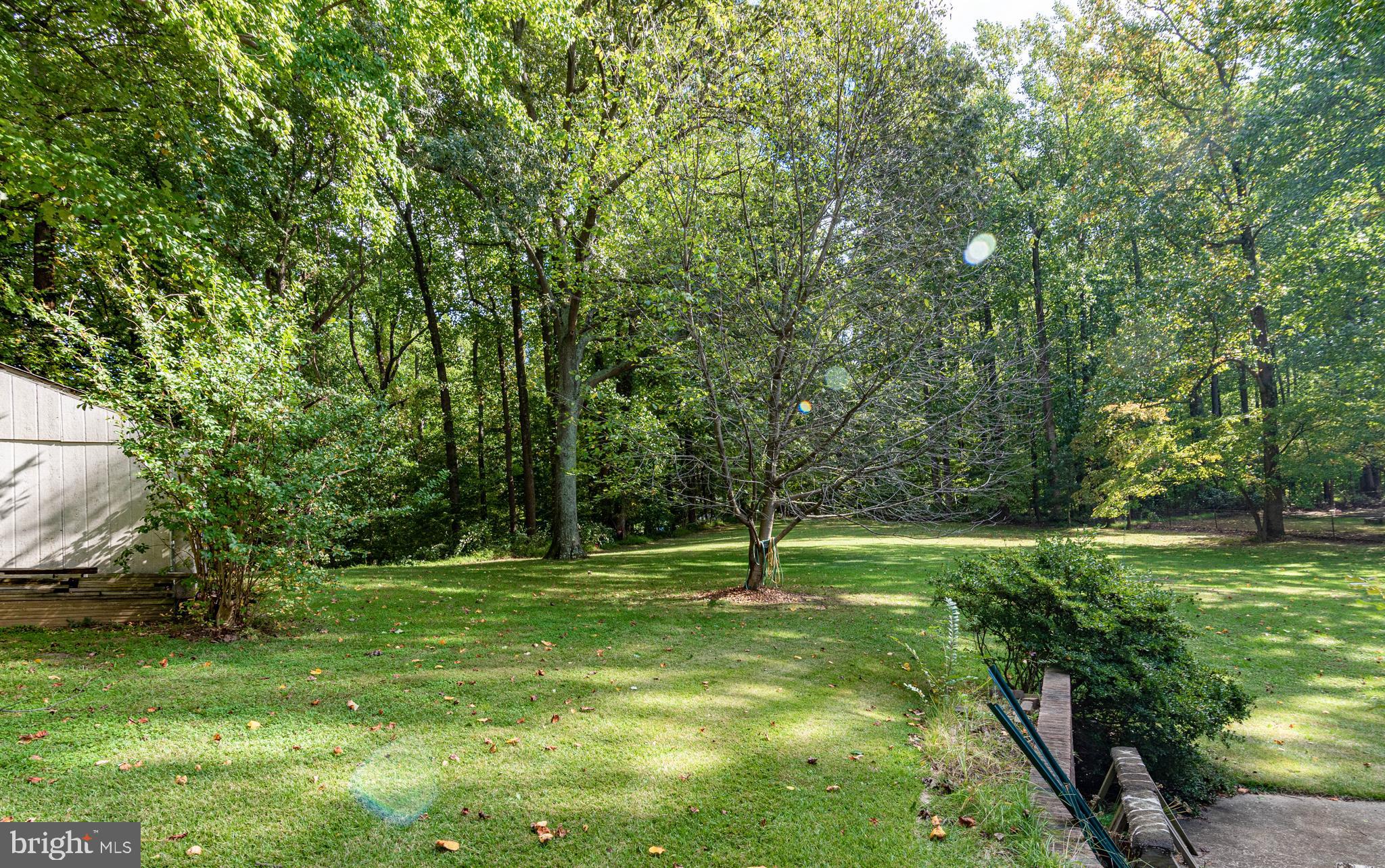 9619 Boyds Turn Road Owings, MD 20736 - Photo 56 of 69 a backyard of a house with lots of green space