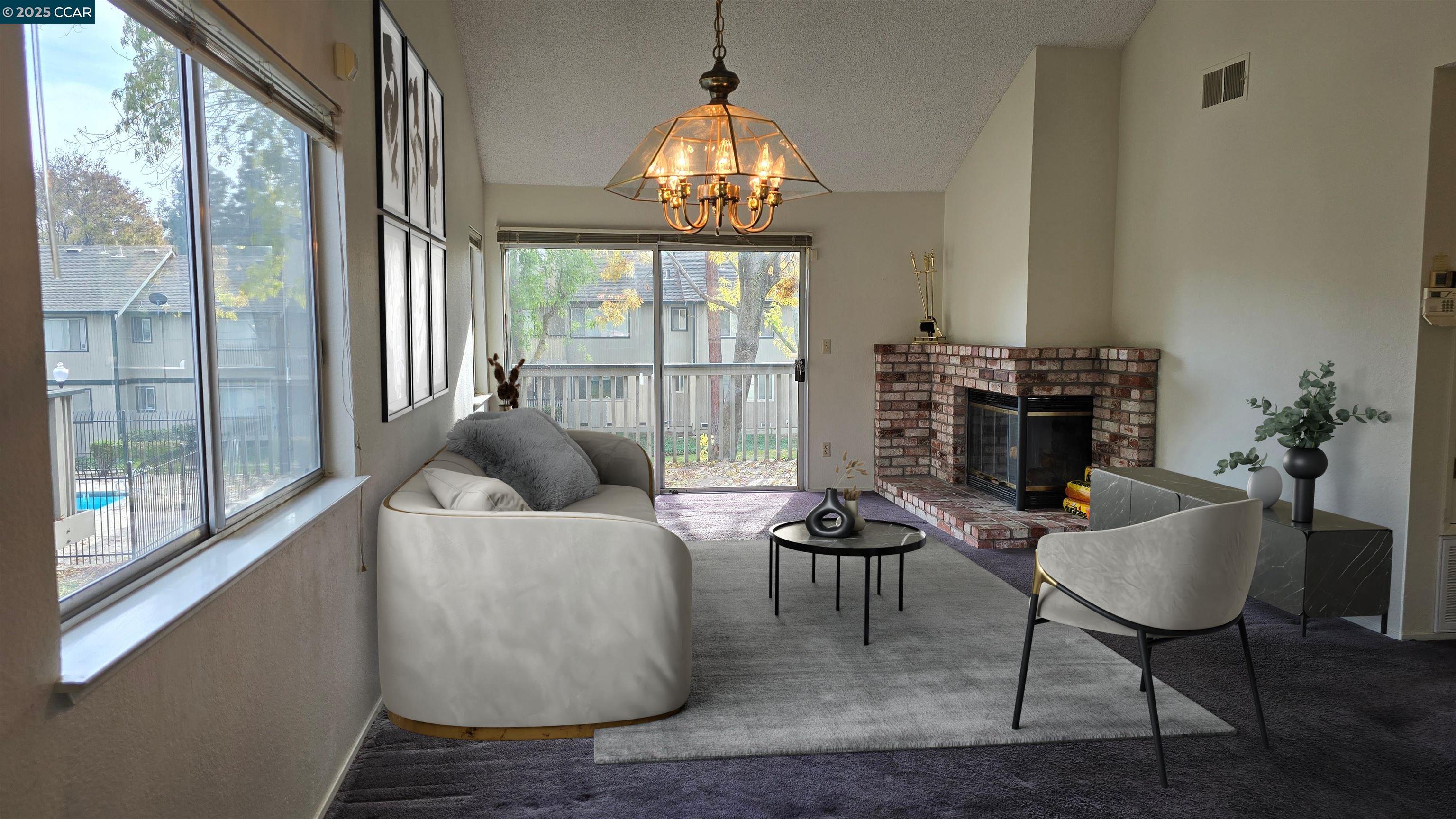 1123 Chadwick Circle Bay Point, CA 94565 - Photo 11 of 22 a living room with furniture and a chandelier