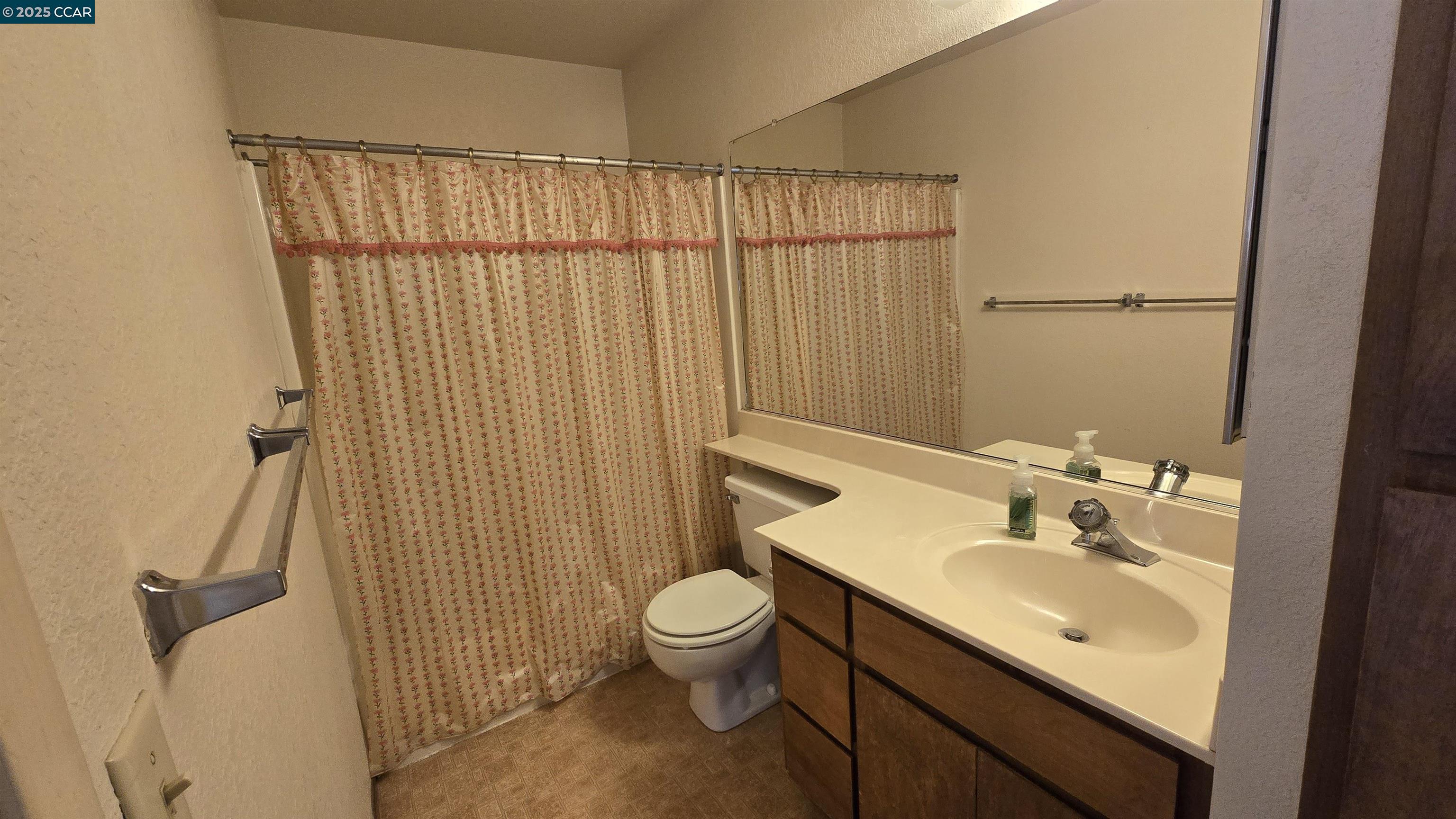 1123 Chadwick Circle Bay Point, CA 94565 - Photo 16 of 22 a bathroom with a granite countertop sink toilet and shower