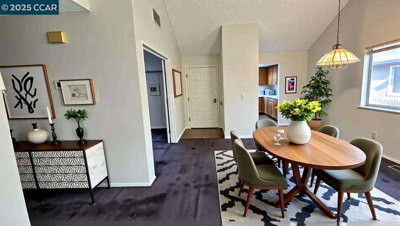 1123 Chadwick Circle Bay Point, CA 94565 - Photo 9 of 22 a view of a dining room with furniture and a potted plant