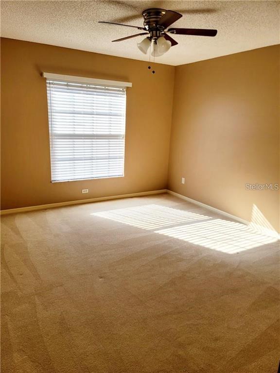 2163 Elm Street, Unit 803 Dunedin, FL 34698 - Photo 11 of 15 a view of an empty room with a window