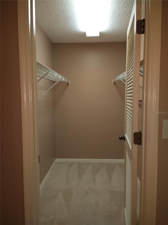 2163 Elm Street, Unit 803 Dunedin, FL 34698 - Photo 10 of 15 a bathroom with a shower