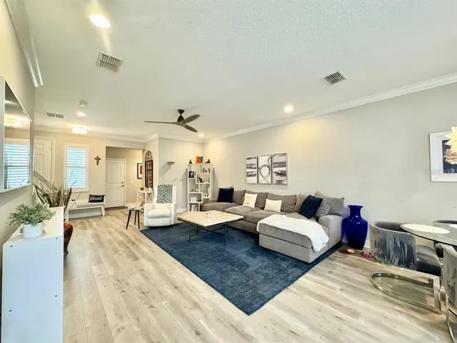 a living room with furniture and a couch