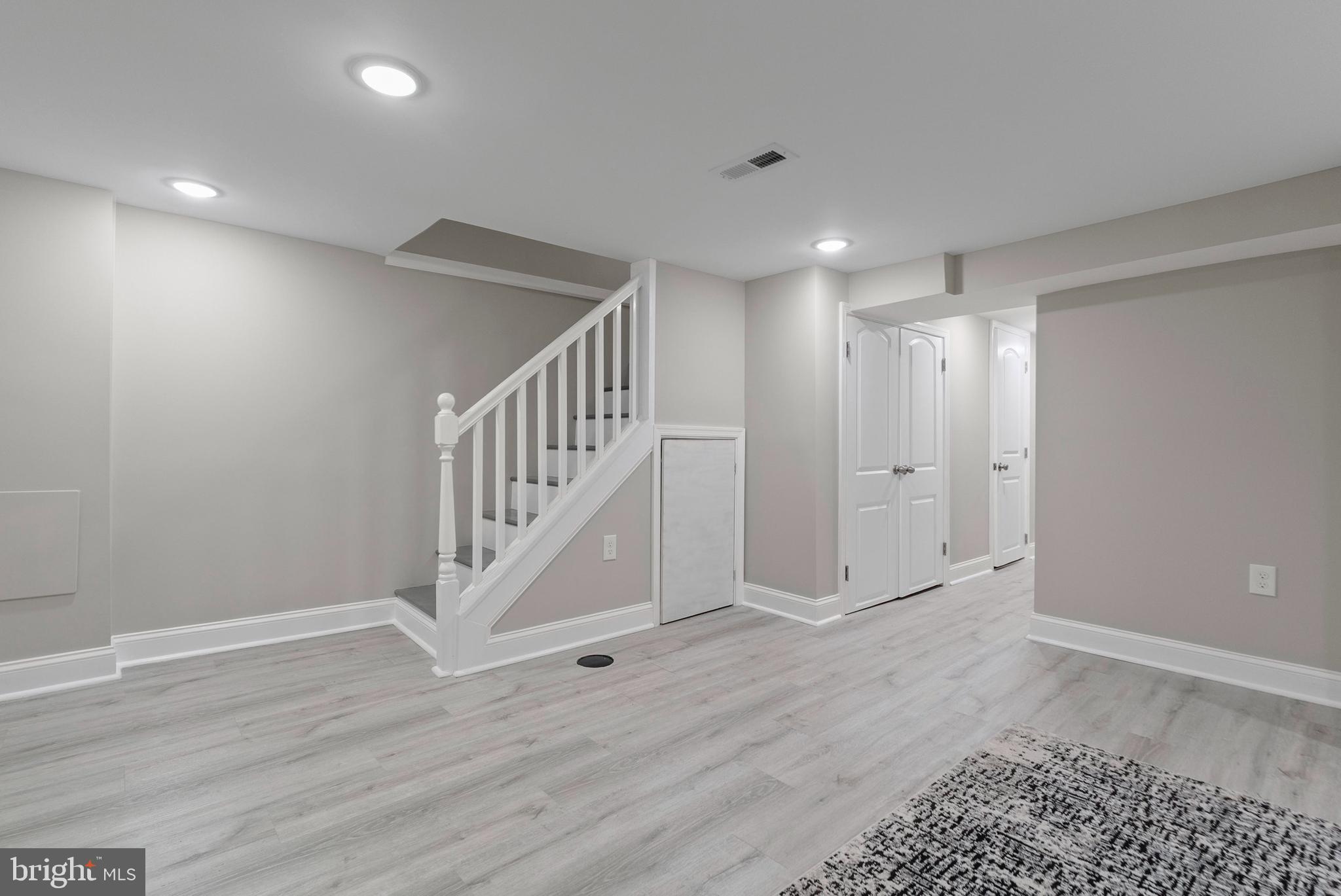 1641 Northwick Road Baltimore, MD 21218 - Photo 15 of 24 a view of an entryway with wooden floor