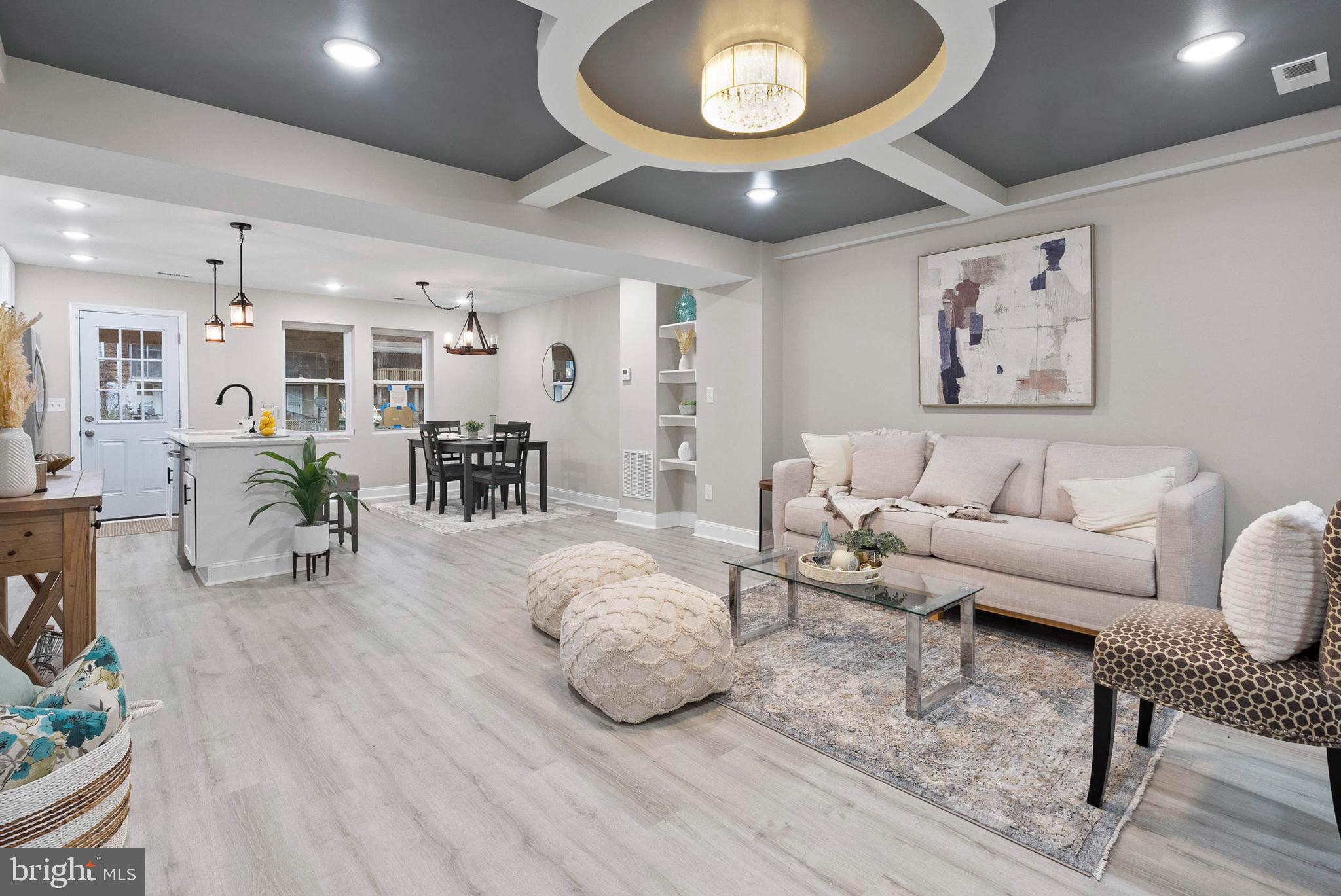 1641 Northwick Road Baltimore, MD 21218 - Photo 2 of 24 a living room with furniture and a large window