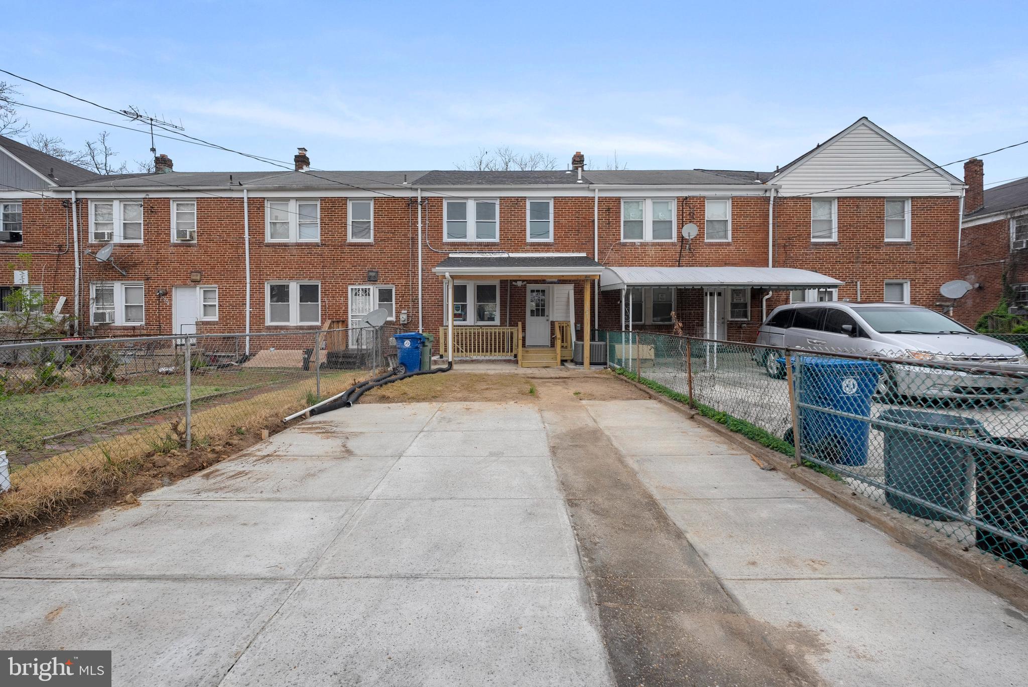 1641 Northwick Road Baltimore, MD 21218 - Photo 21 of 24 a front view of a house with a yard