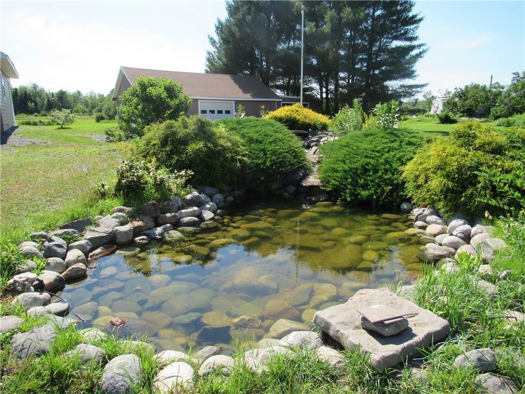 84 Embden Pond Road North Anson, ME 04958 - Photo 4 of 14 waterfall pond out front