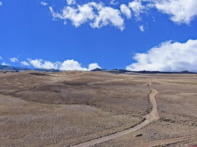 a sign on the wall next to a building