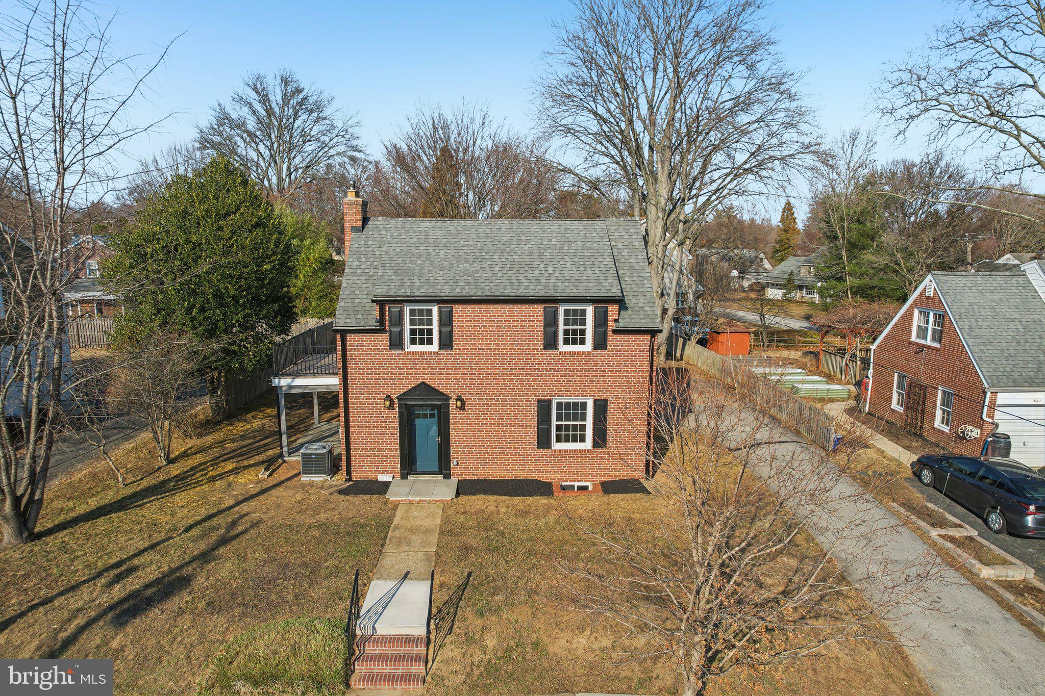 607 Fairview Road Swarthmore, PA 19081 - Photo 3 of 63 a view of a house with a yard and large tree