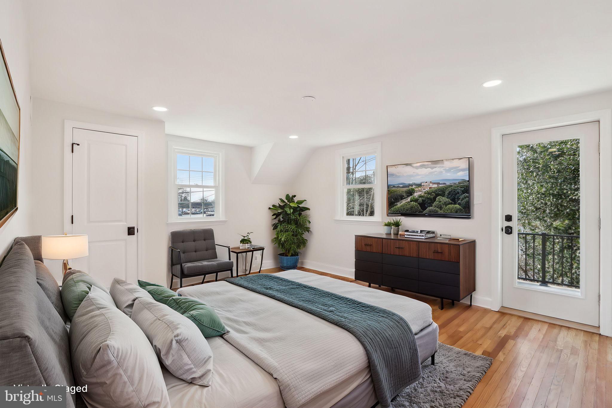 607 Fairview Road Swarthmore, PA 19081 - Photo 36 of 63 a bedroom with a large bed and a window