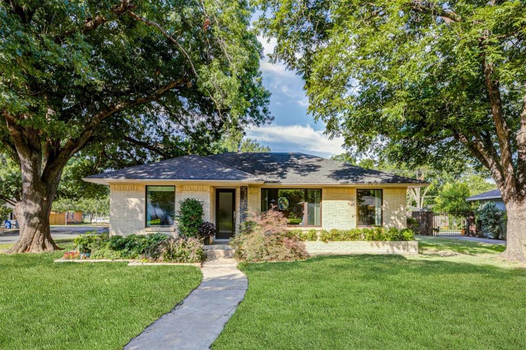 1630 Loree Drive Dallas, TX 75228 - Photo 1 of 20 a front view of house with yard and trees
