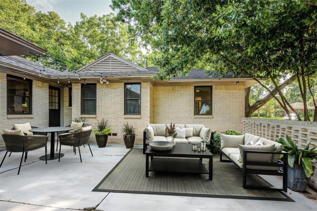 1630 Loree Drive Dallas, TX 75228 - Photo 15 of 20 a outdoor space with patio the couches and a dining table with garden view